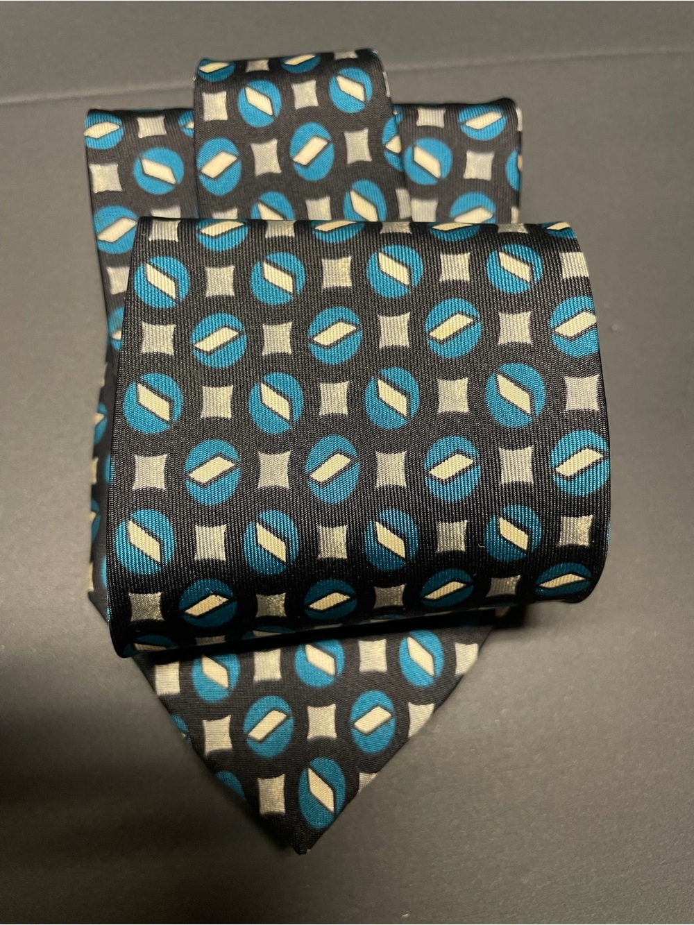 Men's Black Silk Tie with Teal and Cream Geometric Circles